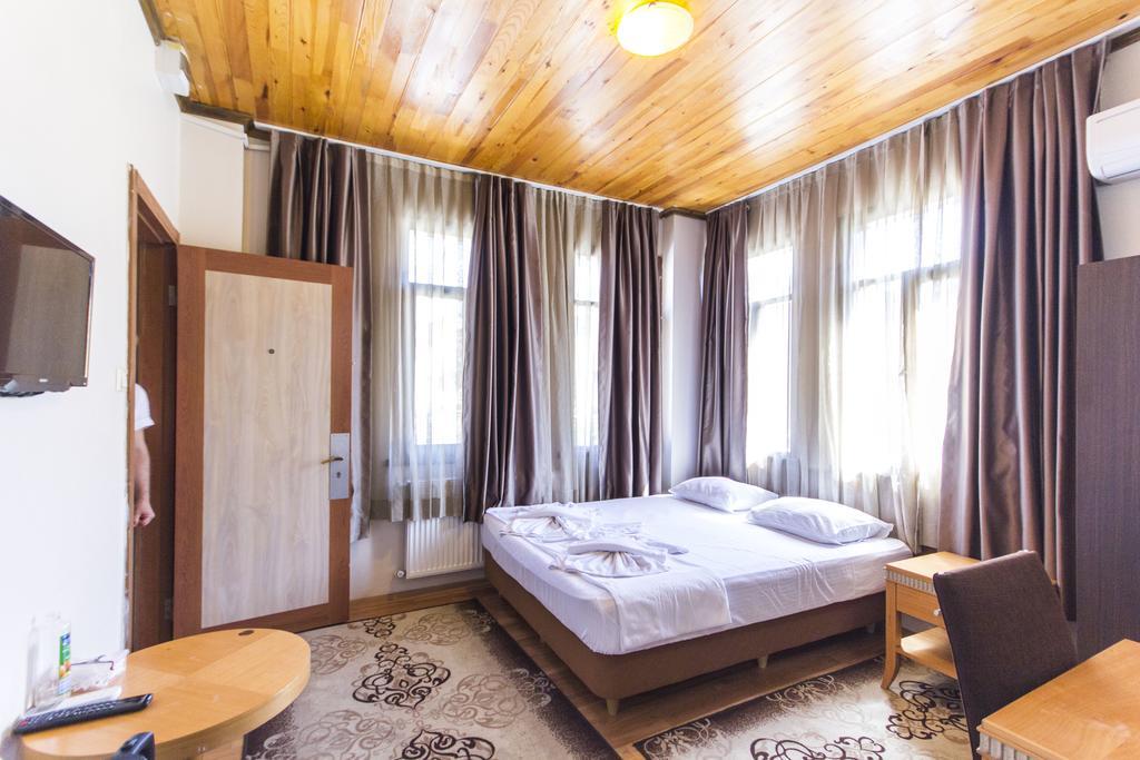 Herton Hotel Istambul Quarto foto